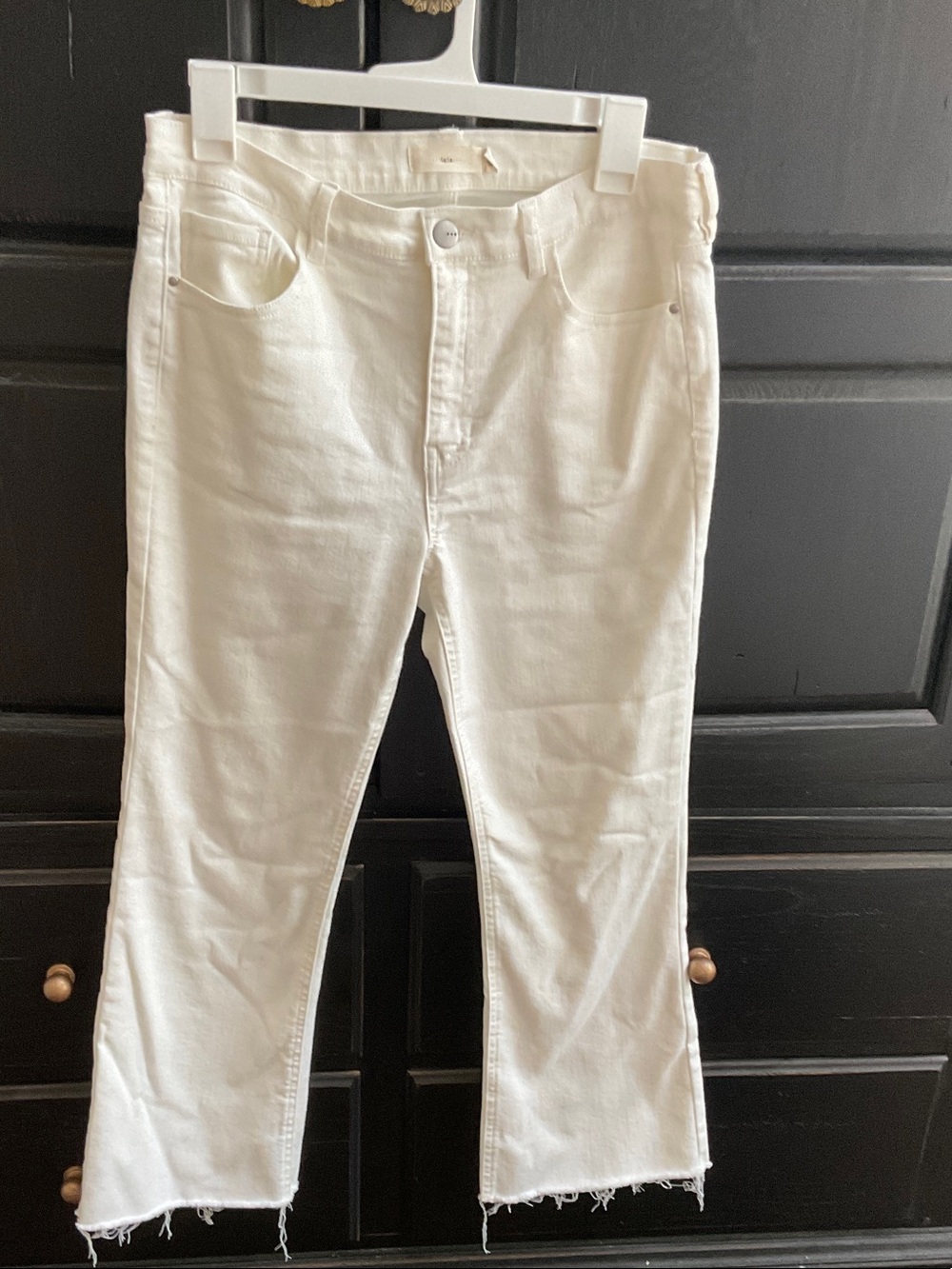 tgla…. Women’s White high rise kicked flare Jeans